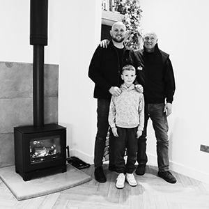 Sam Hamer, Stove Industry Supplies, and family with the finished Basset 5.