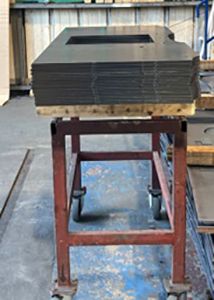 Stove manufacturer fined after sheets of metal fell on an employees leg.