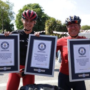 Chimney sweep sets THREE world records on epic global bike ride