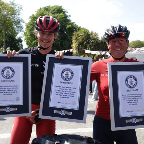 Chimney sweep sets THREE world records on epic global bike ride